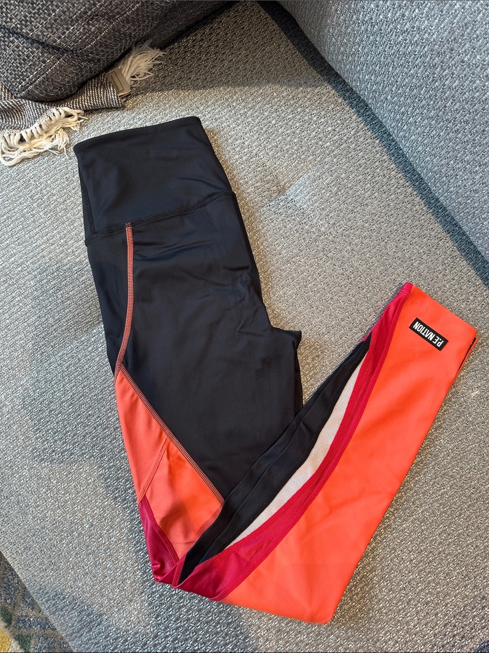 LIKE NEW P.E Nation Black with Orange & Pink Colorblock full length leggings